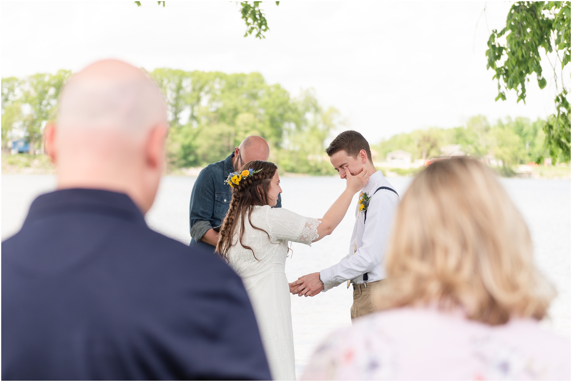 Bride wiping away tear at their Kokomo, IN Wedding