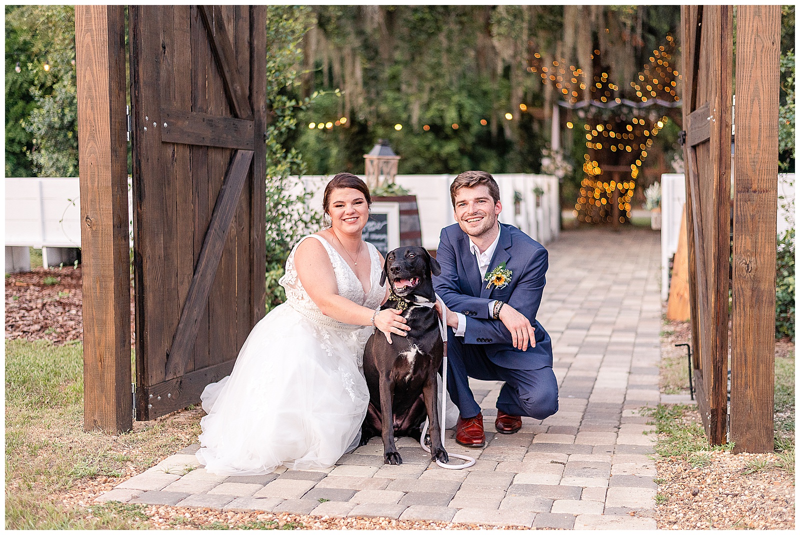 Bride and Groom portraits with their black lab dog at a Wedding at Ever After Farms Blueberry Barn 