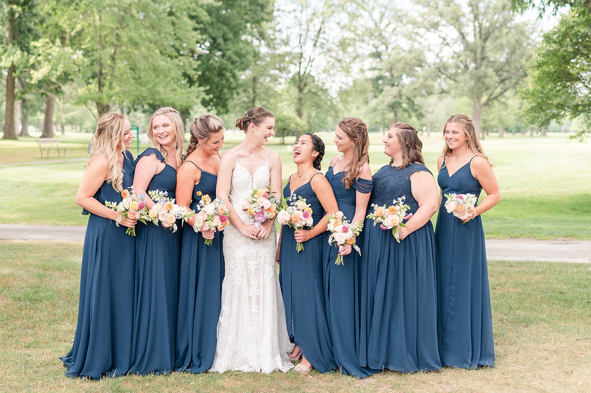 Bride with her bridesmaids laughing| Anderson Country Club Wedding, Indiana