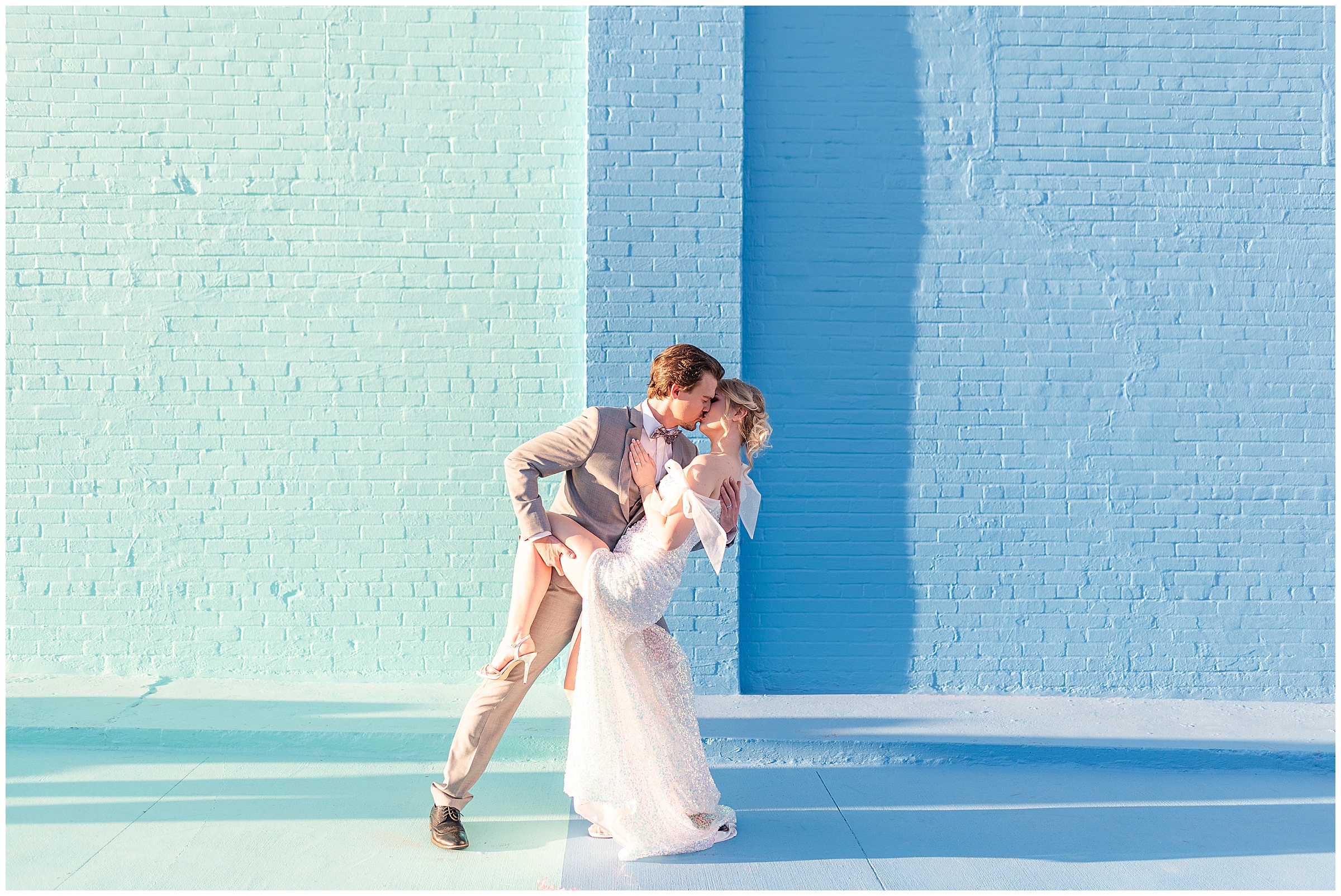 Iridescent Wedding at Haus 820  | Bride and groom kissing and dipping