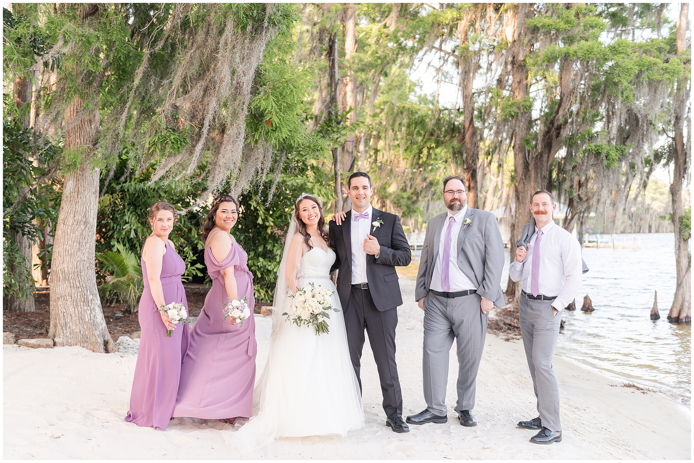 Bridal party photos on the beach at a Paradise Cove Wedding in Orlando, FL