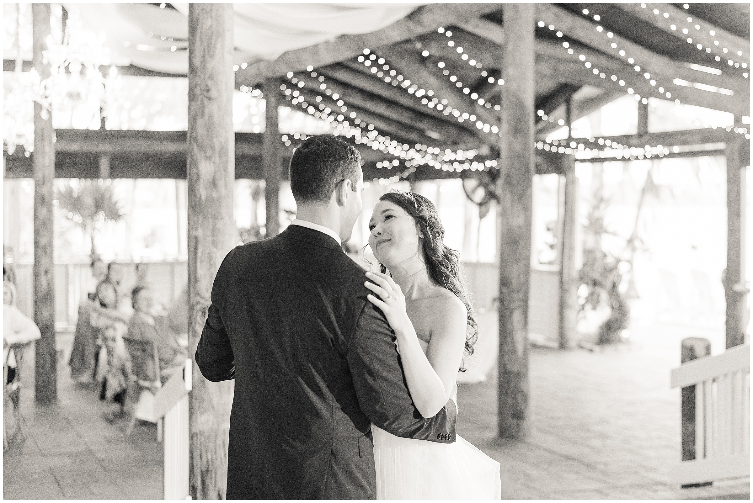 Bride and groom dancing at the reception during their Paradise Cove Wedding in Orlando, FL