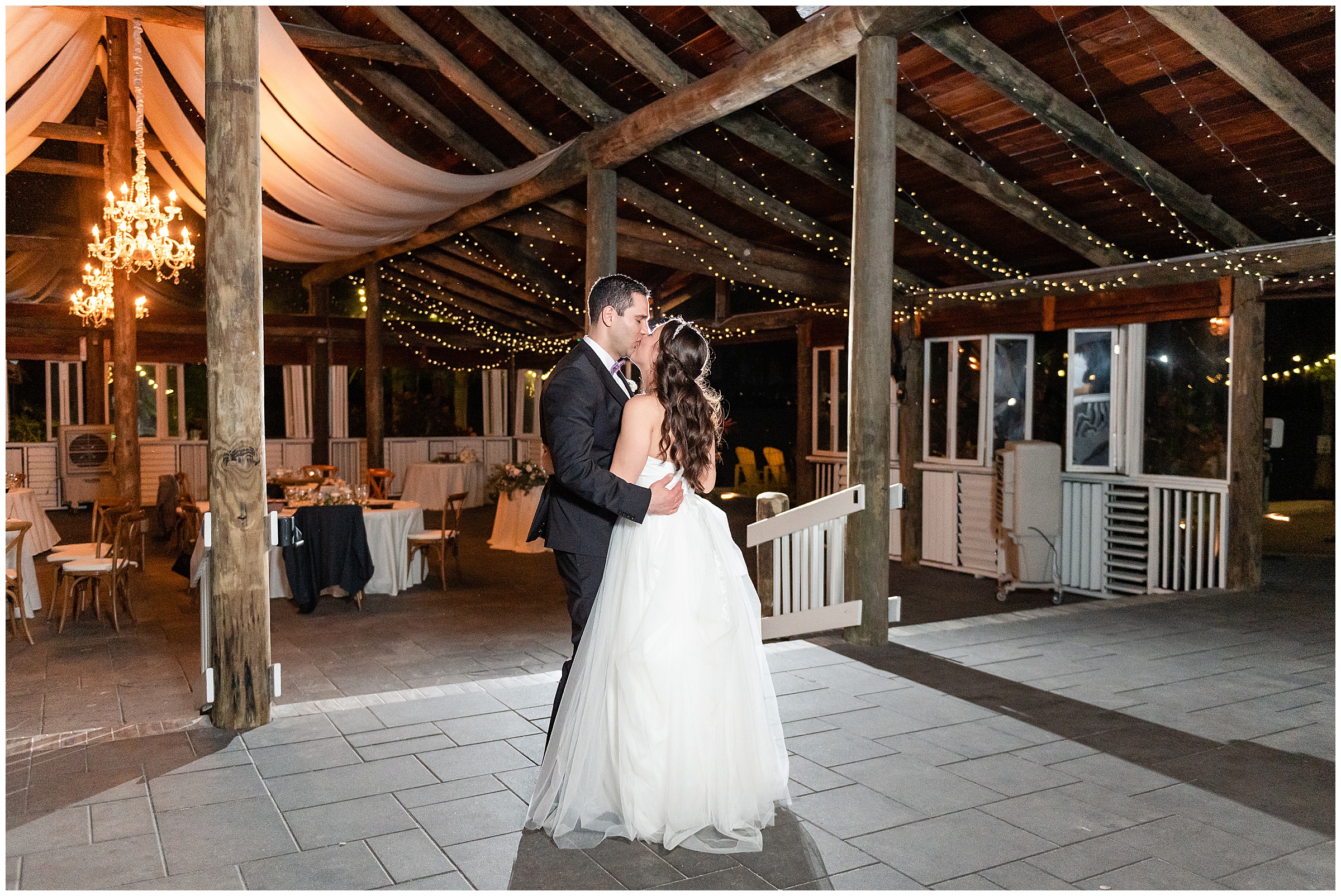 Bride and groom sharing a private last  dance at their Paradise Cove Wedding in Orlando, FL