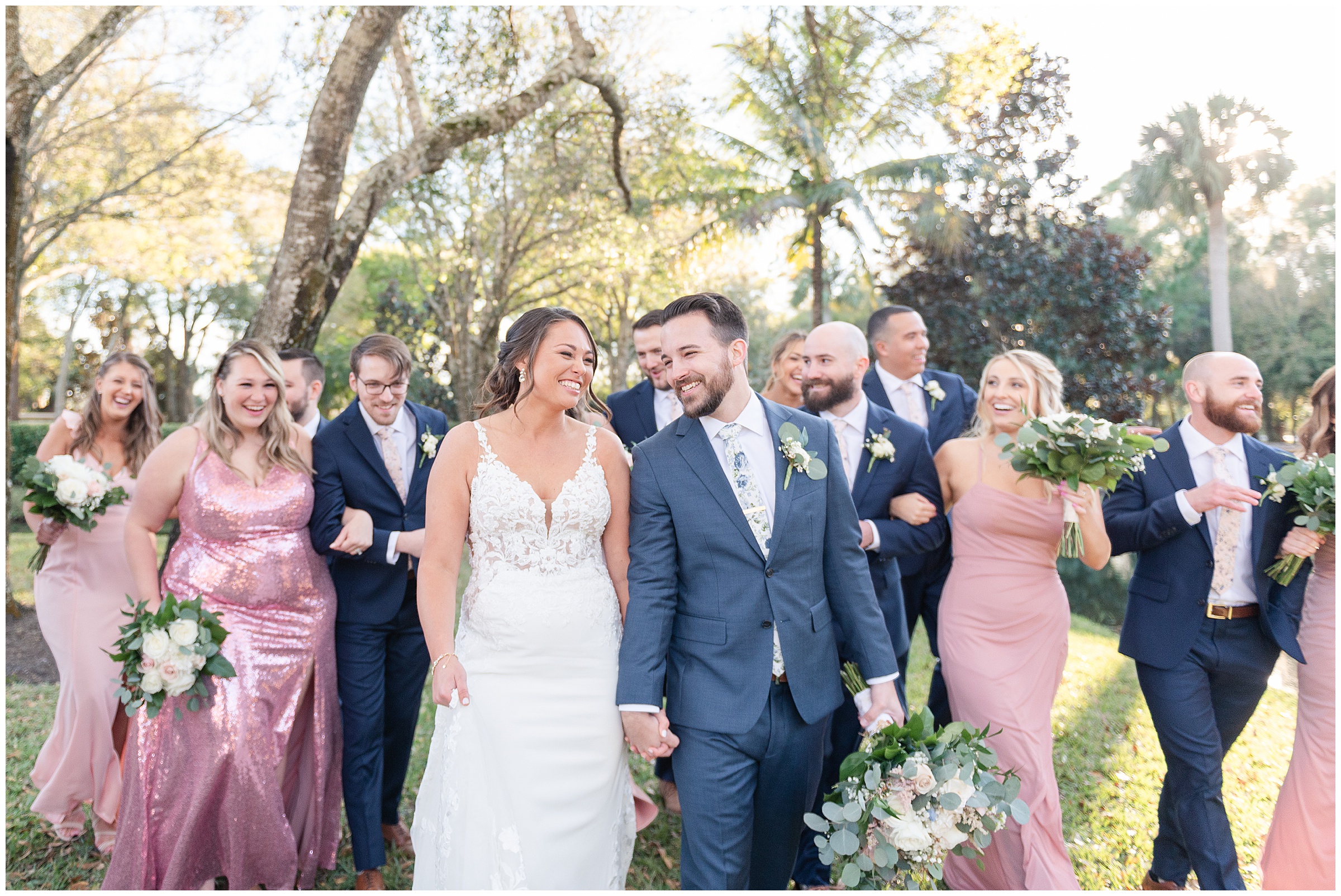 Bride and groom with bridal party photos | Magnolia Manor Wedding in Vero Beach