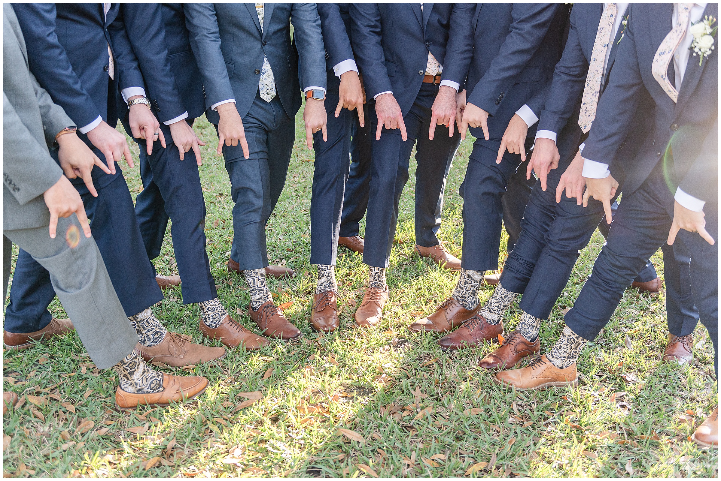 Groom and groomsmen with UCF matching socks | Magnolia Manor Wedding in Vero Beach